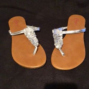 Candie’s sparkly silver flip flops